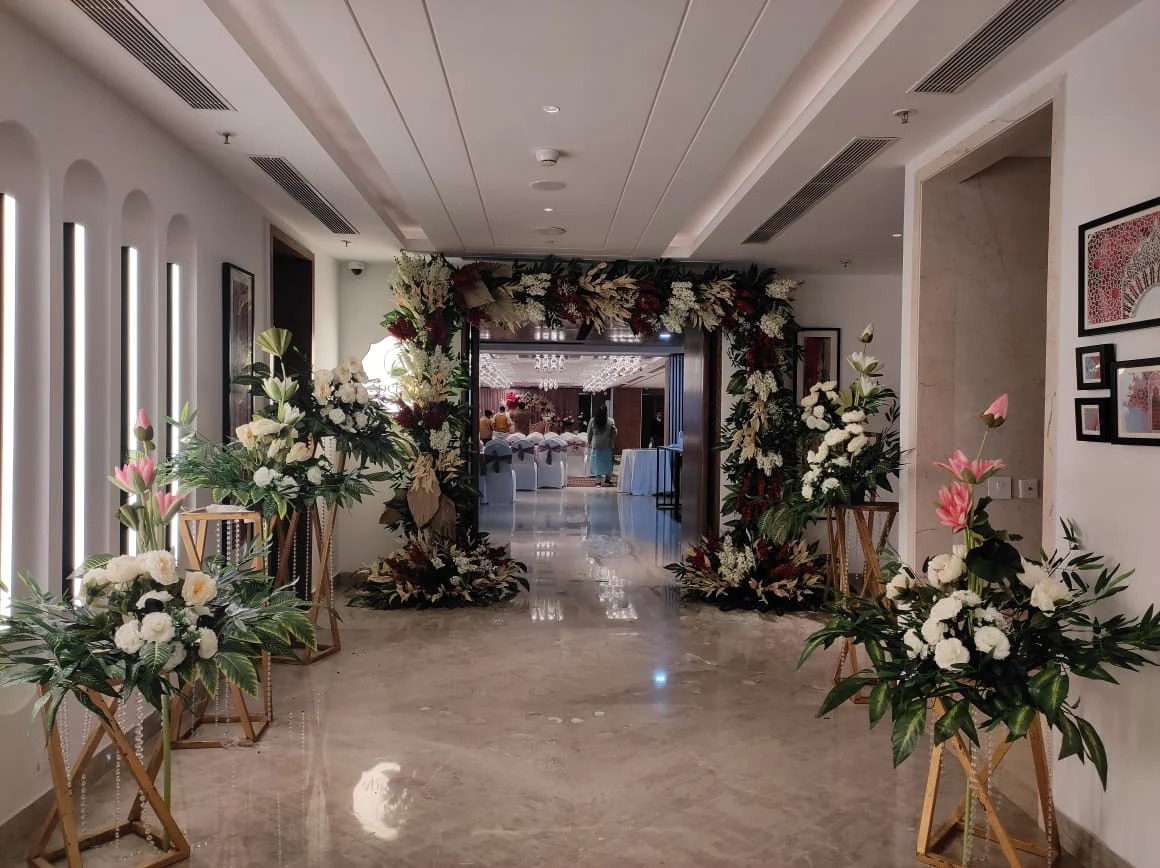 Elegant floral arch entrance to event venue